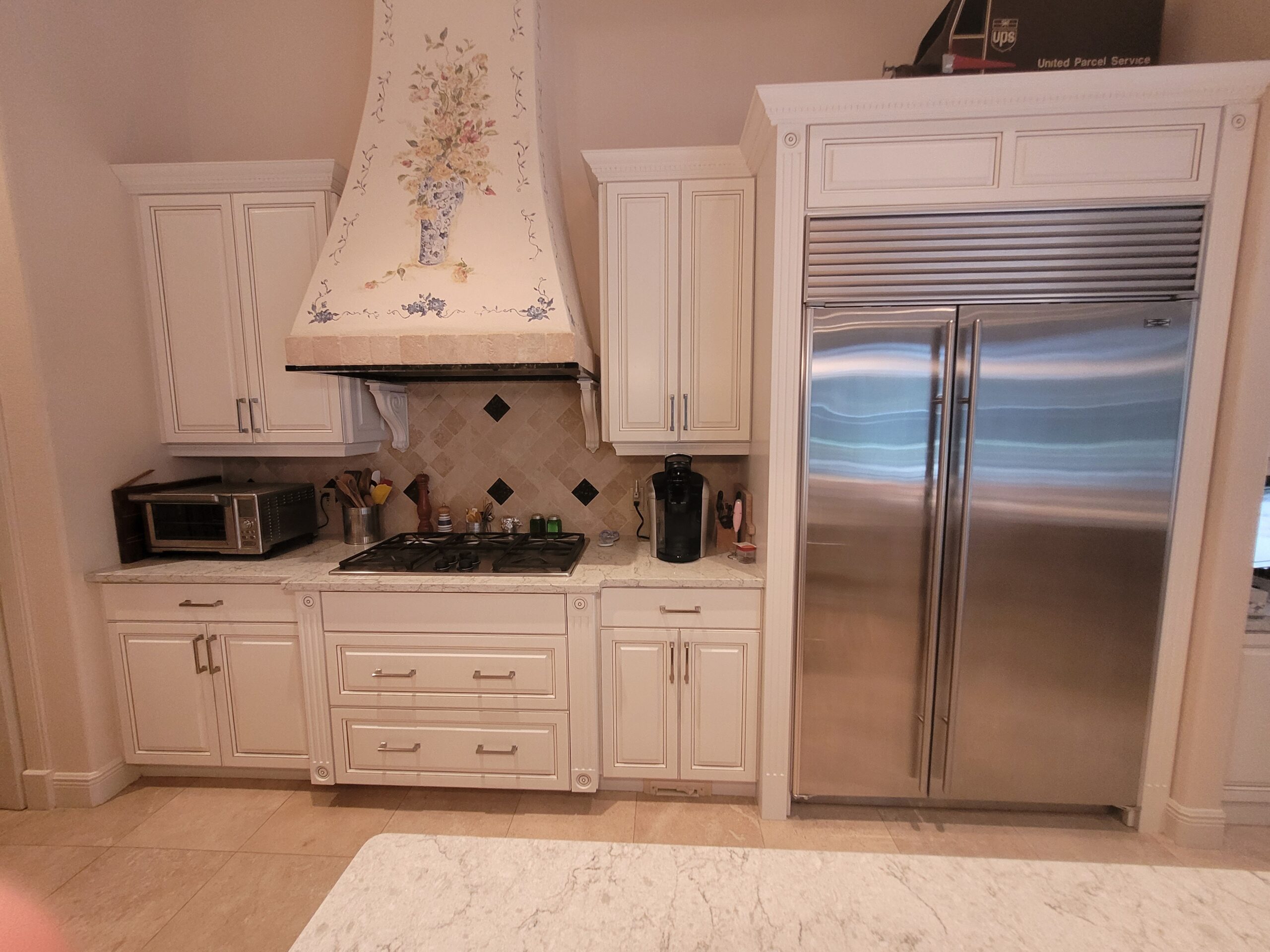 Cream kitchen with painted hood