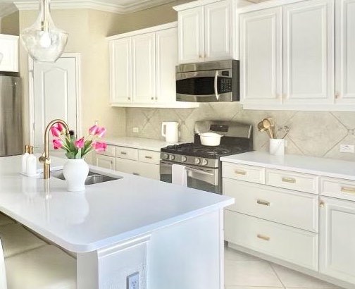 Bright white kitchen after refinishing